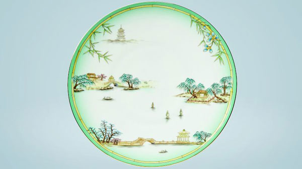 图说：国宴餐具的图案，采用富有传统文化审美元素的“青绿山水”工笔带写意的笔触创造。创意团队图